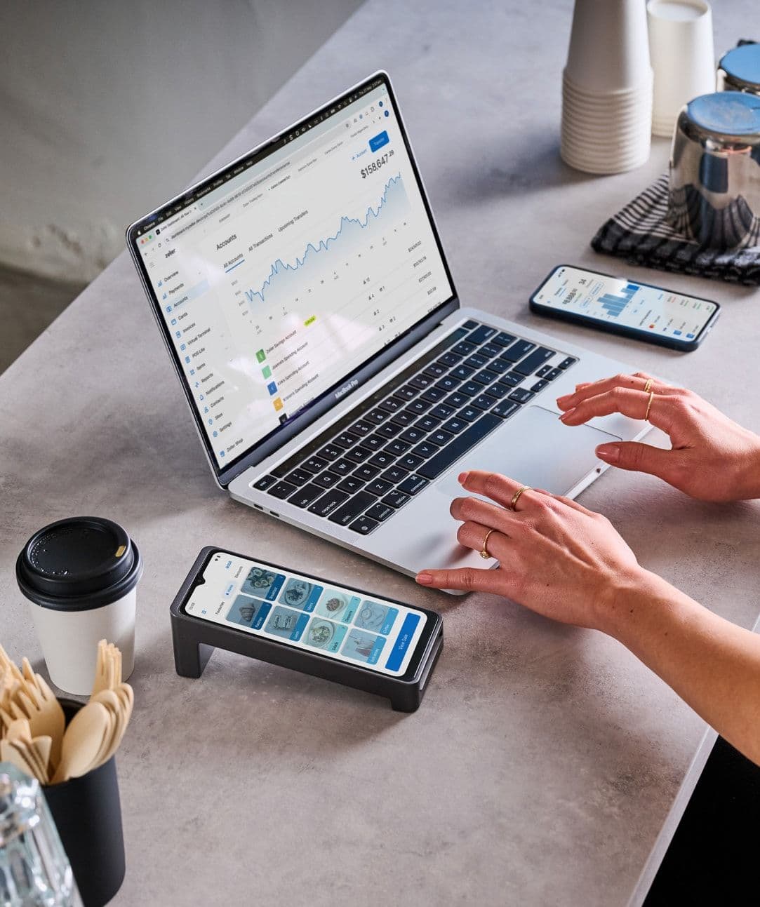 Zeller - Terminal 2, laptop and phone in cafe business