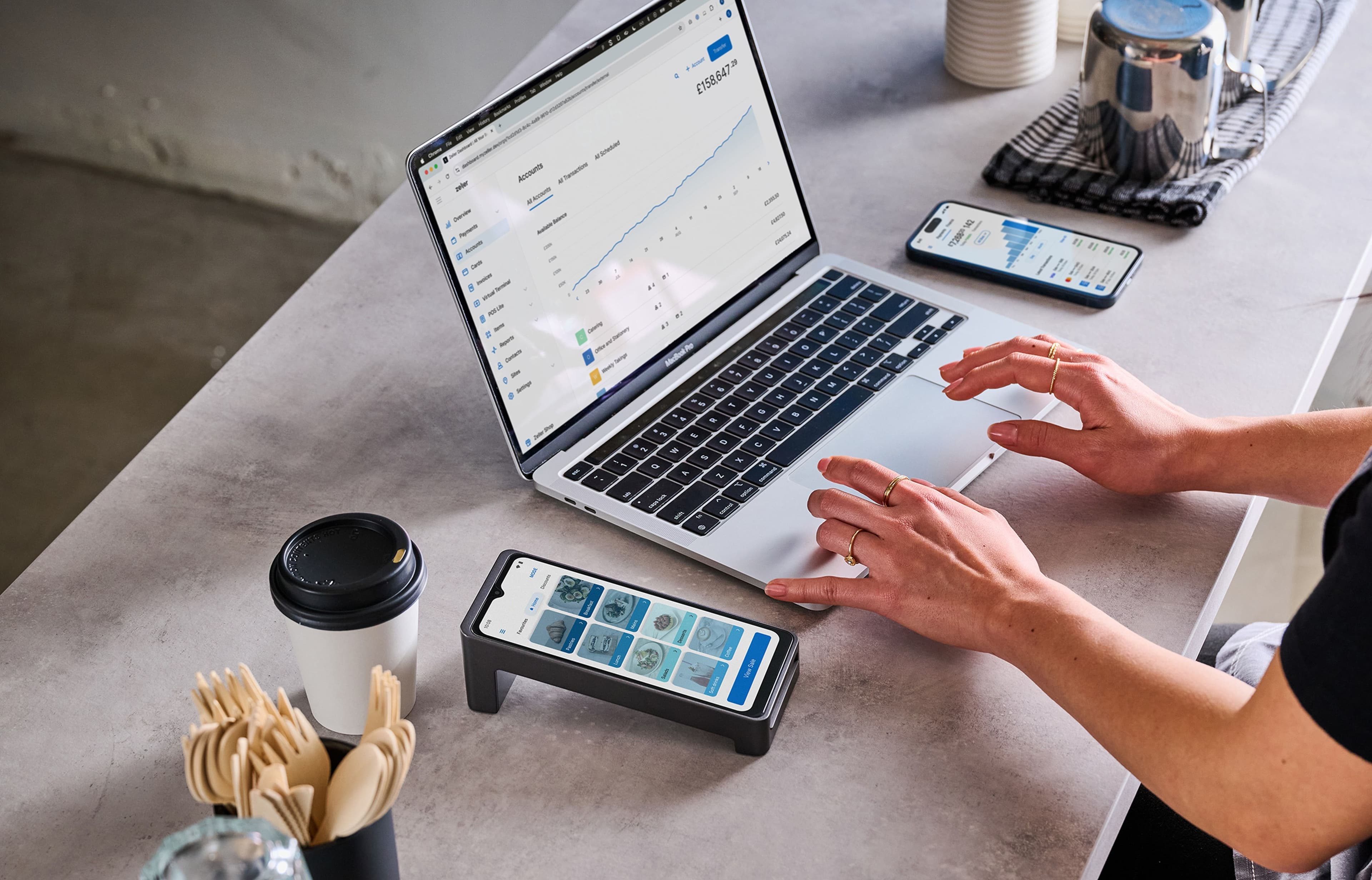 Zeller - Terminal 2, laptop and phone in cafe business